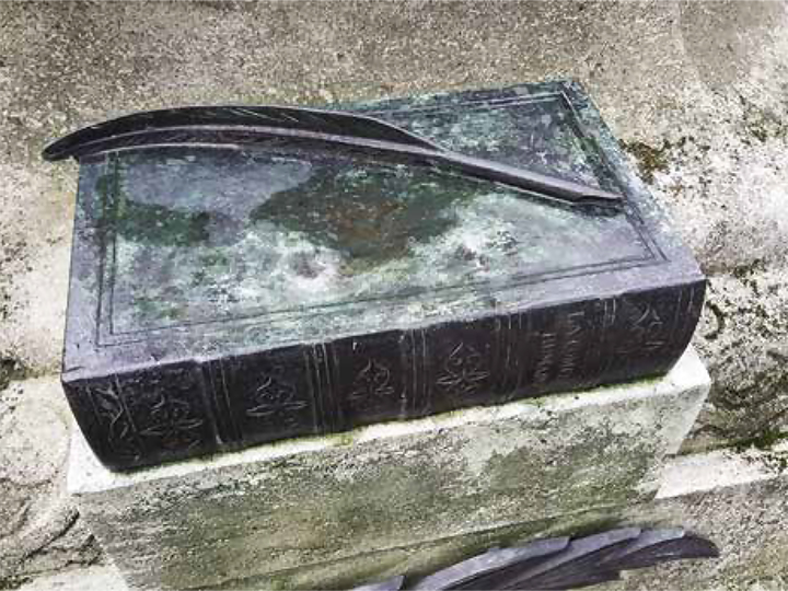 Bronze volume of Balzac's La Comédie Humaine at Père-Lachaise Cemetery
