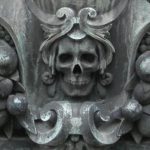 Skull carving on tomb